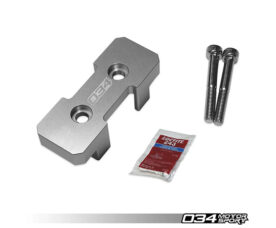 Aluminum automotive bracket with two holes, plus two bolts and a Loctite patch, branded 034 Motorsport on white background.