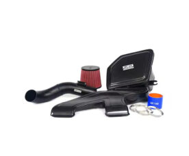 Carbon fiber car intake kit with a red cone filter, tubes, clamps and silicone couplers laid out for installation