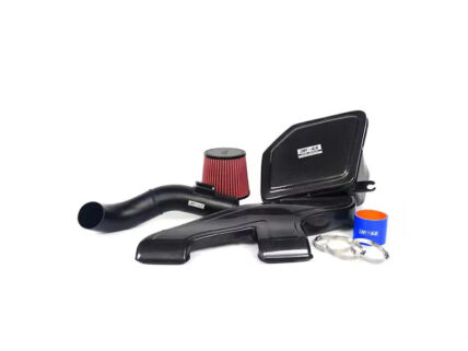 Carbon fiber car intake kit with a red cone filter, tubes, clamps and silicone couplers laid out for installation