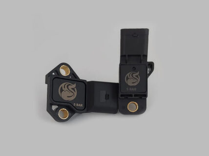 Two black 5-bar valve adapters with gold terminal inserts on a gray background.