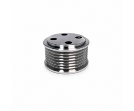 Shiny silver metal spool (bobbin) with ridged sides and four holes on the top surface.
