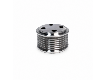 Shiny silver metal spool (bobbin) with ridged sides and four holes on the top surface.