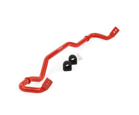 Red automotive sway bar (anti-roll bar) with two black mounting bushings and a white spacer/clip nearby, used in vehicle suspension.
